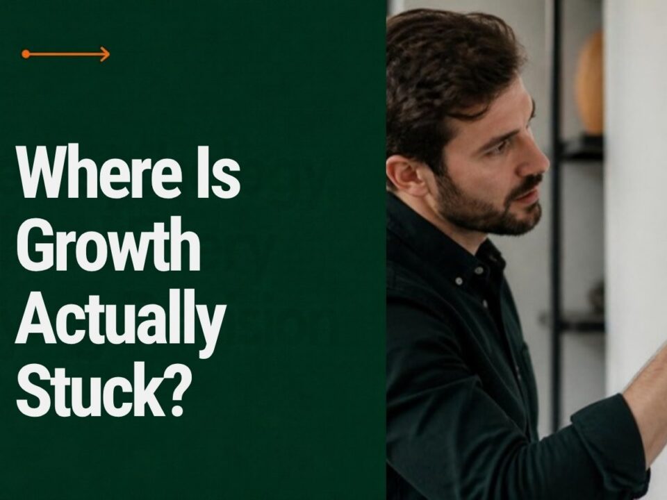 Business owner reviewing growth data to find the bottleneck limiting growth